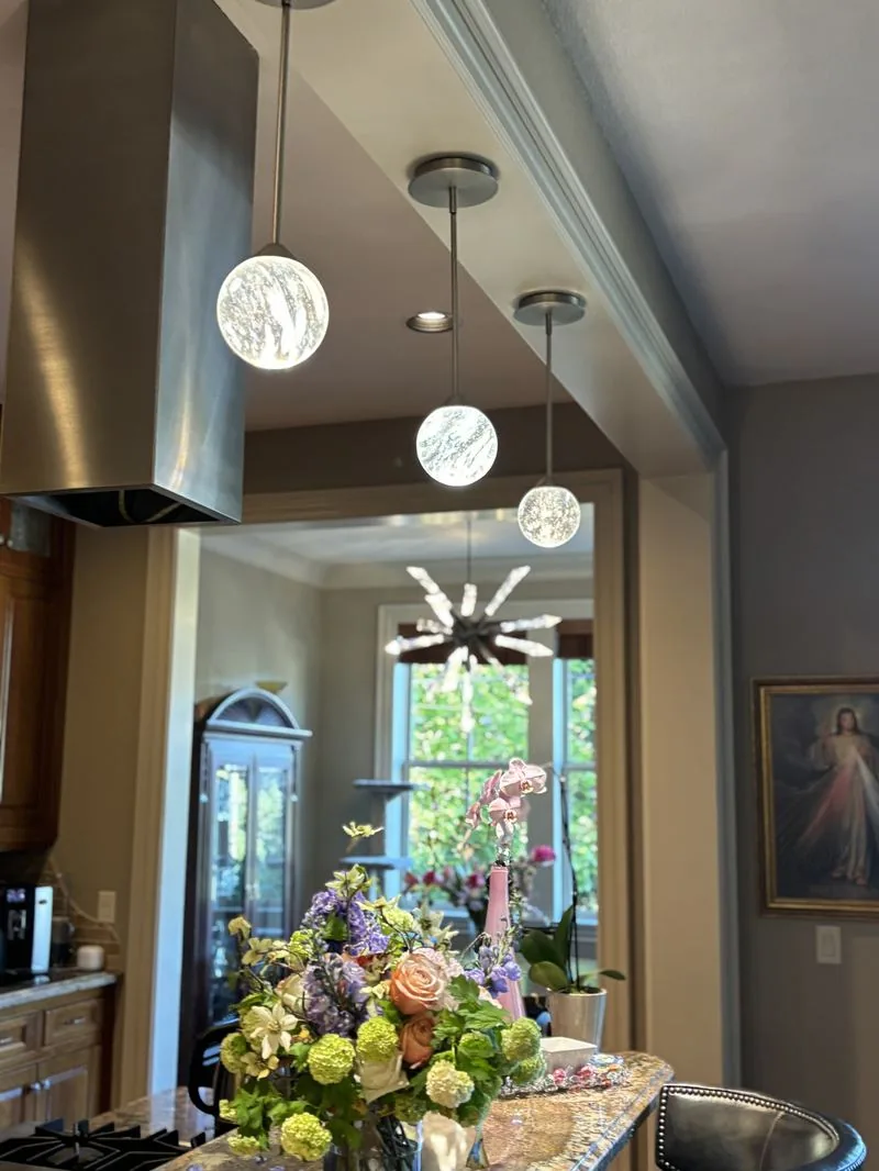 Finished kitchen with pendant and accent lighting